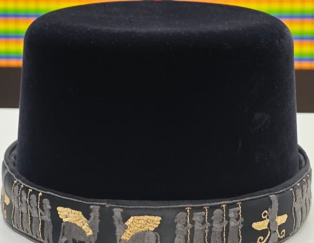 Black cap with gold and grey embroidery