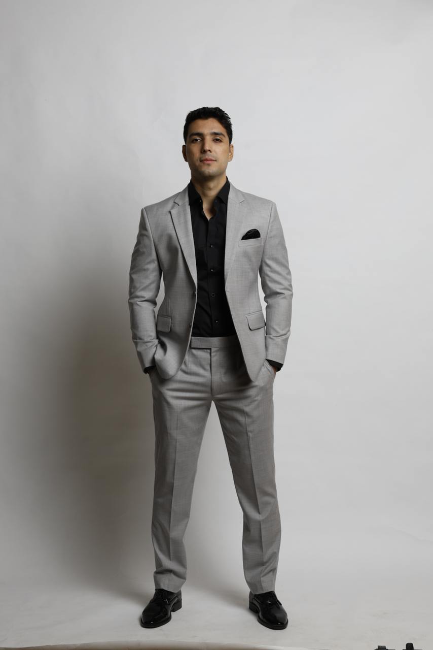 Light grey tailored suit with black shirt